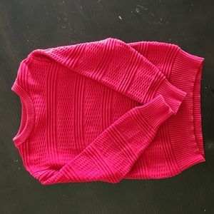 Red knit sweater with light knit work design.